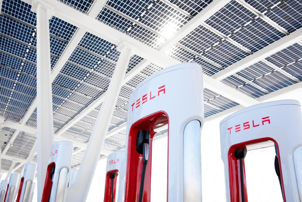 Tesla opens supercharger sites to all EVs